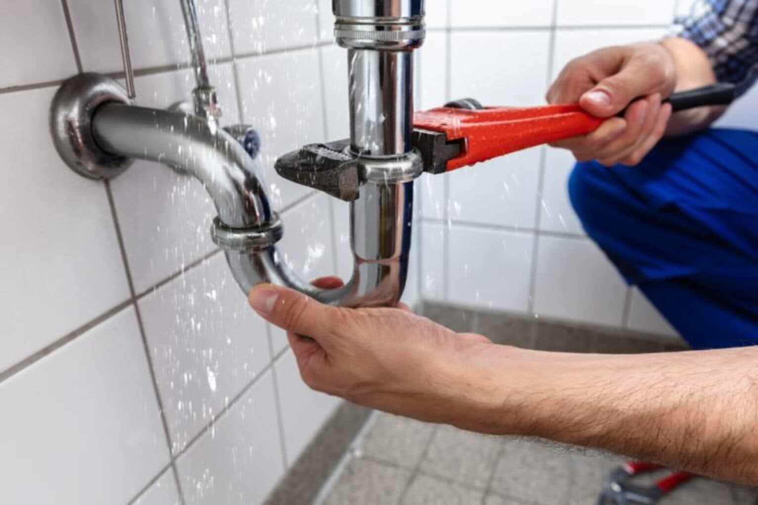 plumber with wrench
