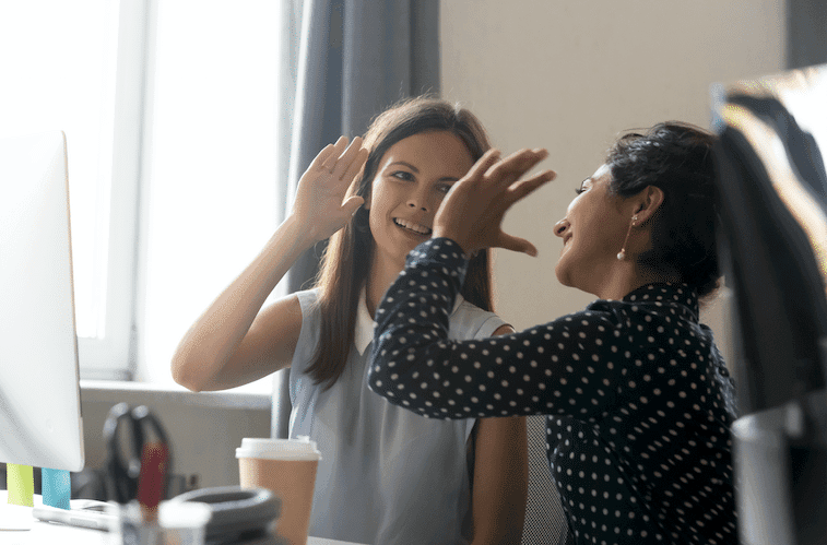 2 workers high five