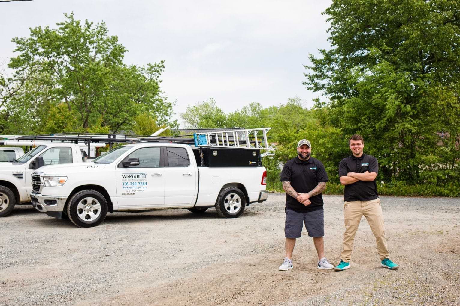 Techs Next To A service Truck